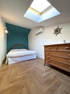 Ένα ή περισσότερα κρεβάτια σε δωμάτιο στο La terrazza su Viareggio