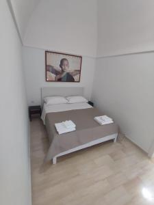 Postel nebo postele na pokoji v ubytování Le case di Roberto