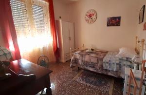 Postel nebo postele na pokoji v ubytování B&B Rosa