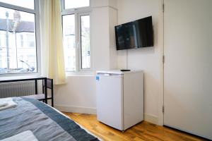 TV a/nebo společenská místnost v ubytování Centra Studios