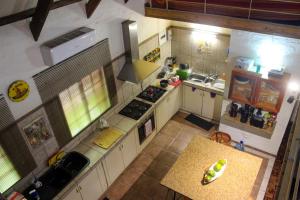 an overhead view of a kitchen with white cabinets at Casa Bena in Maun