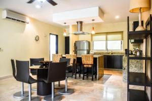 Køkken eller tekøkken på Mamitas Village by Casago