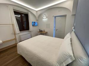 Postel nebo postele na pokoji v ubytování Maera B&B Ravello