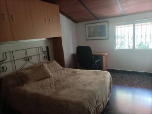 Cama o camas de una habitación en Villa Bendición - Subbética Cordobesa