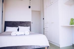 Voodi või voodid majutusasutuse Summer Villa Lagonissi toas