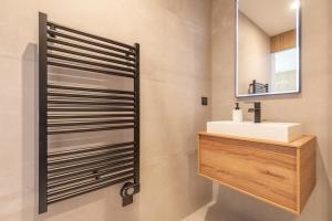 Ένα μπάνιο στο Le Boho . Centre-ville Mâcon . Proche gare . Design . Neuf . Wifi . Climatisation . Confort