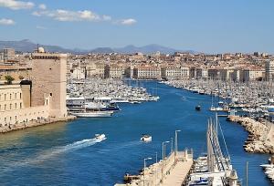 a view of a river with boats in a harbor at Nocnoc - Le Nid in Marseille