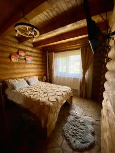 Voodi või voodid majutusasutuse Pensiunea Colț de Rai toas