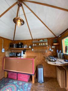 Kuchyň nebo kuchyňský kout v ubytování Boho Bungalow + 37 fotografií