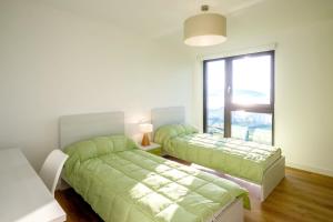 Posteľ alebo postele v izbe v ubytovaní Charming House Sea View in Outes