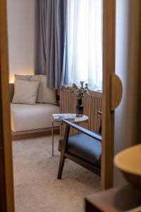 Area soggiorno di Bloom Suites