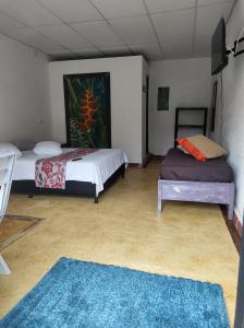 Katil atau katil-katil dalam bilik di La Santa María