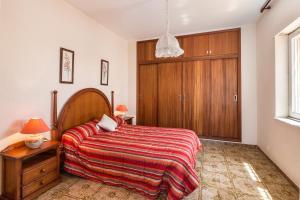 Postel nebo postele na pokoji v ubytování Villa el Carmoli