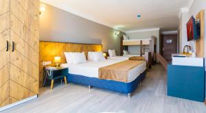 Postel nebo postele na pokoji v ubytování PRIVADO HOTELS