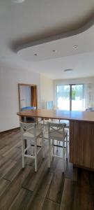 a dining room with a large table and chairs at WellSituated 1 Bedroom Condo in Warsaw freeparking in Warsaw