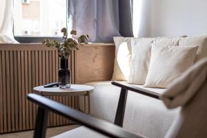 Area soggiorno di Bloom Suites