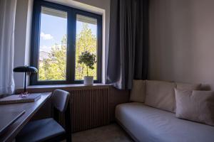 Area soggiorno di Bloom Suites