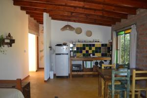 Köök või kööginurk majutusasutuses La Faustina Hospedaje