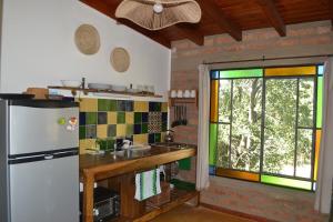 Köök või kööginurk majutusasutuses La Faustina Hospedaje