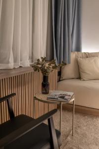 Area soggiorno di Bloom Suites