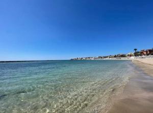 a view of the beach from the shore at Il Vicoletto in Santa Marinella