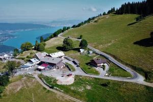 an aerial view of a house on a hill at GITE Didine in Montmin