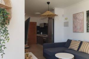 Telewizja i/lub zestaw kina domowego w obiekcie Ola Cotillo! Ver y Sentir el Mar desde casa