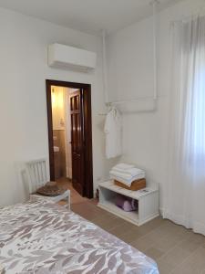 A bed or beds in a room at Il Nido del Gabbiano