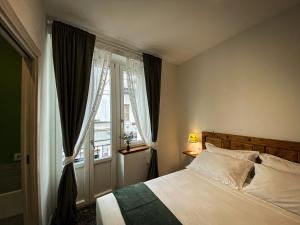 Postel nebo postele na pokoji v ubytování Taffetà b&b