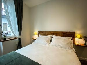 Postel nebo postele na pokoji v ubytování Taffetà b&b