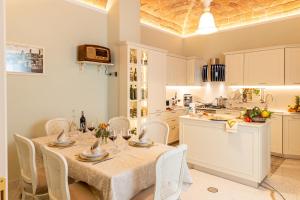Η κουζίνα ή μικρή κουζίνα στο Charming Apartment Cartoni