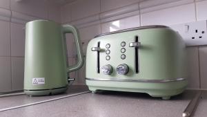 two toasters sitting on a counter in a kitchen at Entire 2 Bedroom Apartment free parking in Saffron Walden
