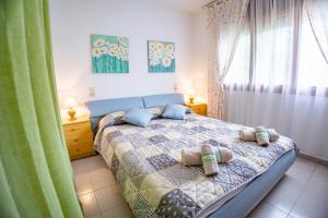 Postel nebo postele na pokoji v ubytování Chalet Migjorn Riumar Pura Natura