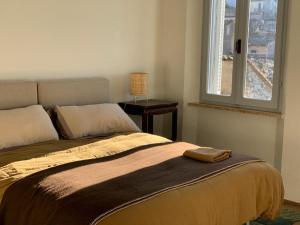Postel nebo postele na pokoji v ubytování Albergo La Pietra
