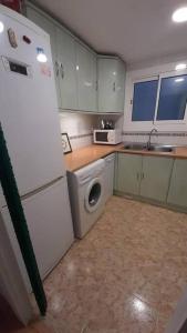 Kuchyň nebo kuchyňský kout v ubytování Fantástico apartamento con piscina en Tossa de Mar