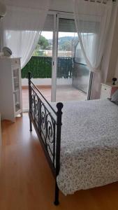 Postel nebo postele na pokoji v ubytování Fantástico apartamento con piscina en Tossa de Mar