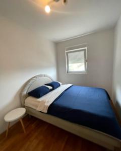 Ліжко або ліжка в номері Apartman Boka Savina