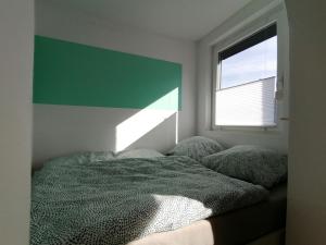Postel nebo postele na pokoji v ubytování Fewo Tespe an der Elbe mit 2 Betten