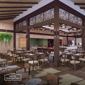 rendering restauracji ze stołami i krzesłami w obiekcie Quinta Santa Bárbara Eco Resort w mieście Pirenópolis