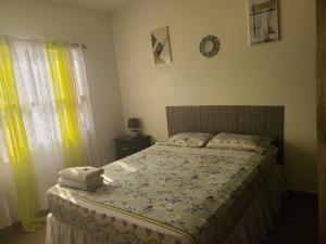 Voodi või voodid majutusasutuse Hospedaje Casa de Luna toas