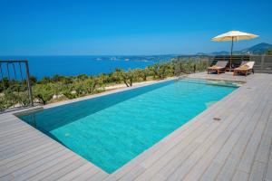 The swimming pool at or close to Villa Katoikia Mia by Villa Plus