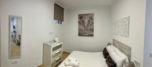 A bed or beds in a room at El Rinconcito de Noa