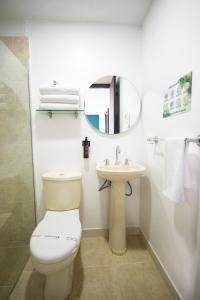 Koupelna v ubytování Greenview Medellin By St Hoteles + 37 fotografií