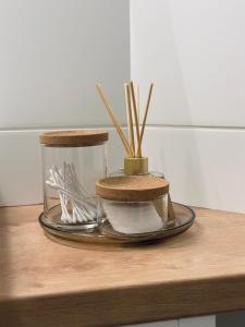 a table with a tray of dishes and chop sticks at Myslbekova 17 in Jáma Jindřich