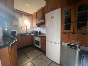 Kuchyň nebo kuchyňský kout v ubytování Casa Delfina