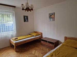 A bed or beds in a room at reginavendeghaz