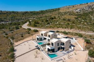 an aerial view of a house with a pool at Villa Axel in Primošten