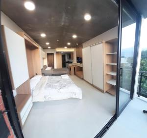 Llit o llits en una habitació de Edificio Flats del sol