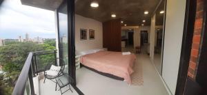 Llit o llits en una habitació de Edificio Flats del sol