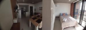 Llit o llits en una habitació de Edificio Flats del sol